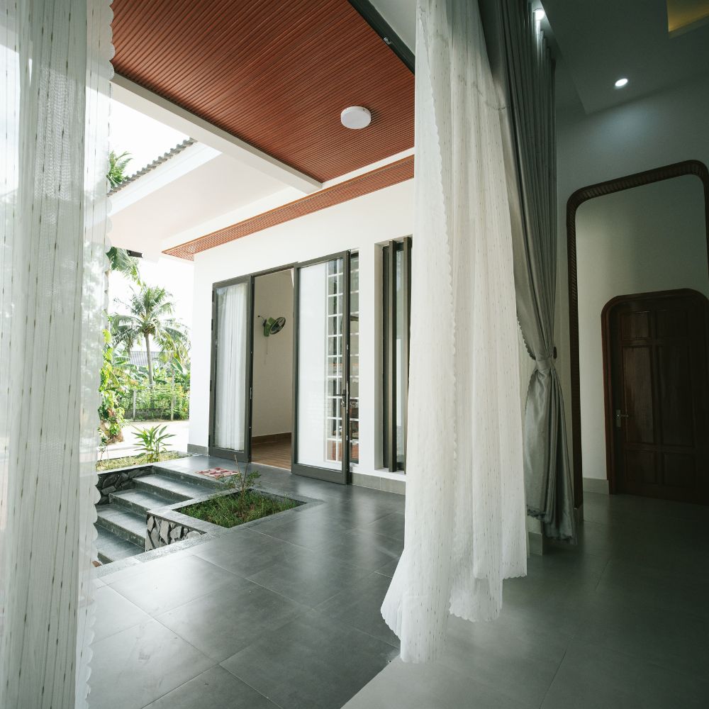 Bright residential entryway with painted walls and trim
