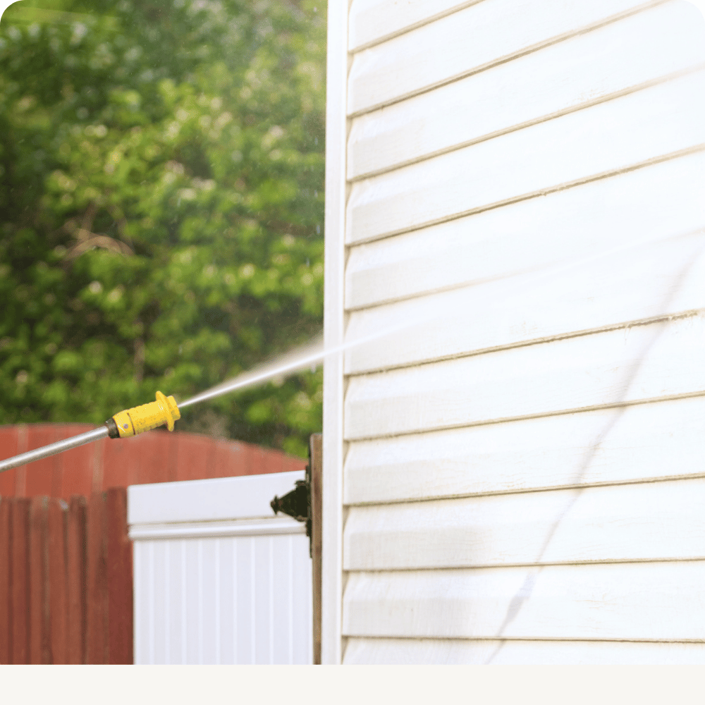 Pressure washing exterior siding