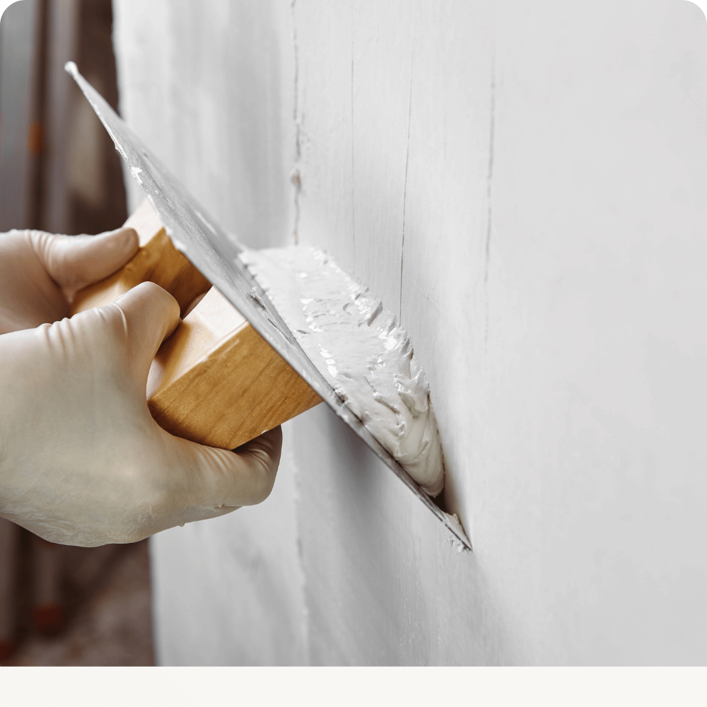 Repairing a damaged wall surface